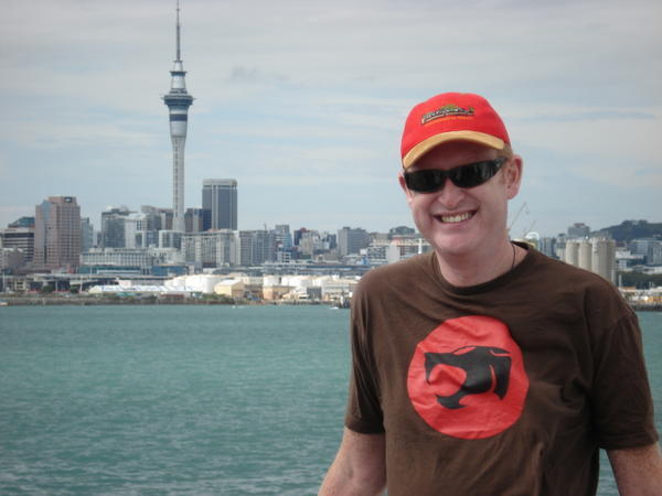 I pose on our cruise around the harbour with Auckland's skyline as a backdrop