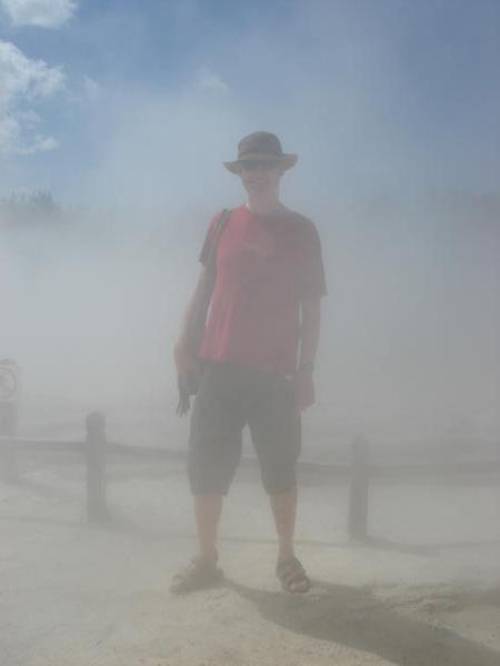 I disappear in the steam at the Waiotapu thermal park