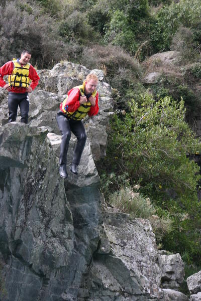 Taking the cliff top plunge - white water rafting trip in Rangatata
