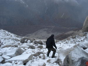 Day Six - Mike clambers down the snow covered icy rocks to our camp below 