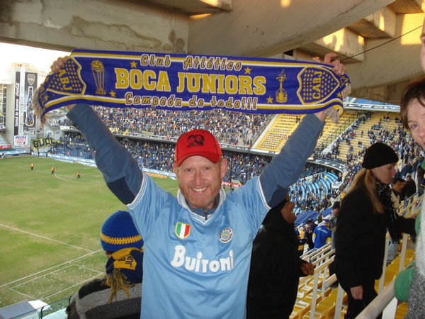 Me at the Boca stadium with wearing my Maradona Napoli shirt waving my new teams scarf!