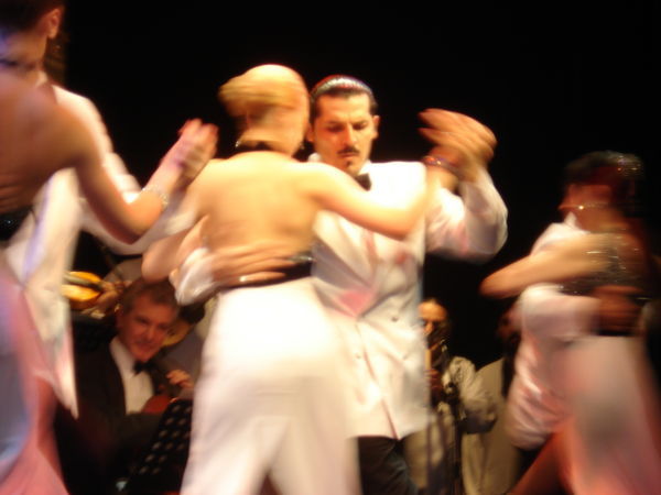 A Freddie Mercury looky likey struts his stuff at the tango show at El Alcamen