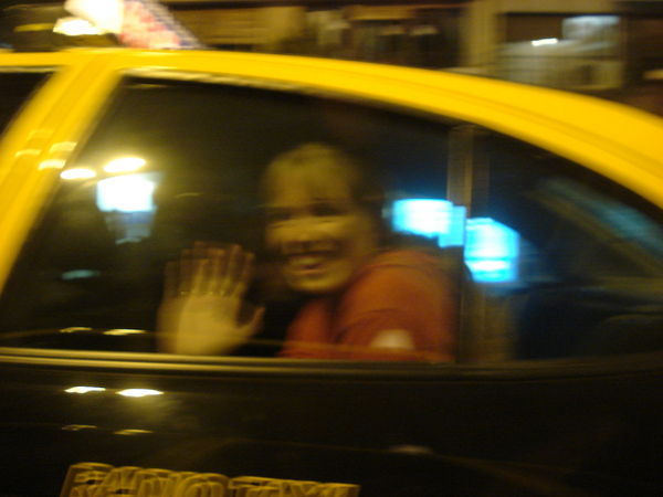 "Follow that taxi!" Rach gives us a wave on our way to Pacha in BA!