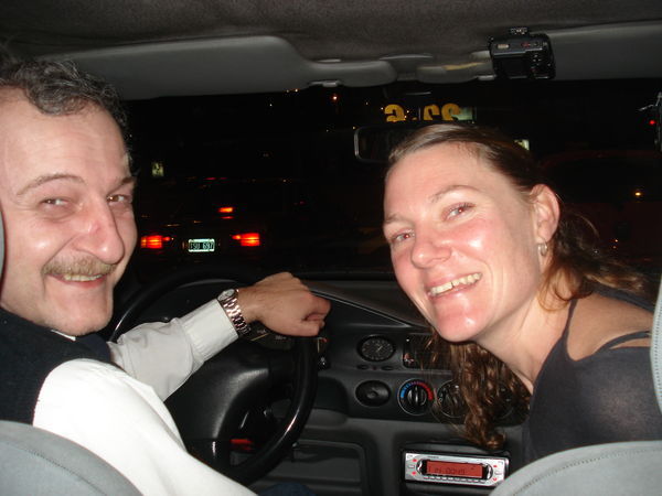 More taxi fun and games...this time Mel smiles with our driver
