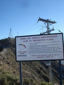 The sign at Cerro Arco saying you can paraglide here...just avoid the telegraph poles!