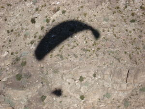 A shadow parachute on the mountain