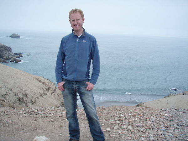Me at the top of one of the shanty town hills with the Pacific Ocean in the background