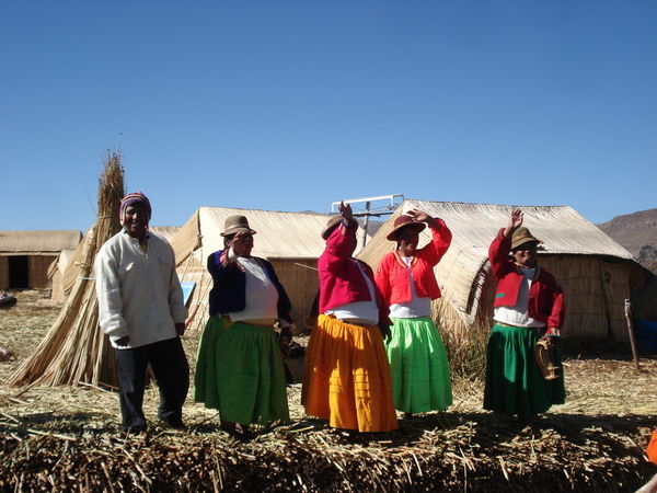 "My Bonnie lies over the ocean" - our boat gets a send off on our floating islands tour - Lake Titicaca