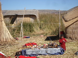 They start the market sellers young out here...on our floating islands tour - Lake Titicaca