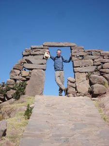 I pose at a gateway on our visit to Isla Taquile