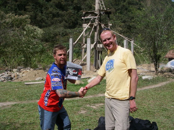 Alastair presents me with my tee-shirt at the bottom of the Worlds Most Dangerous Road