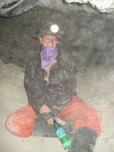 Helen smiles through the dust on our mine tour in Potosi