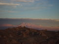 The mountains go pink as sun begins to go down over the Valley of the Moon