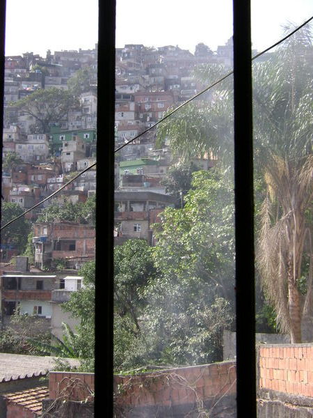 The Rocinha flavela rises up through the railings