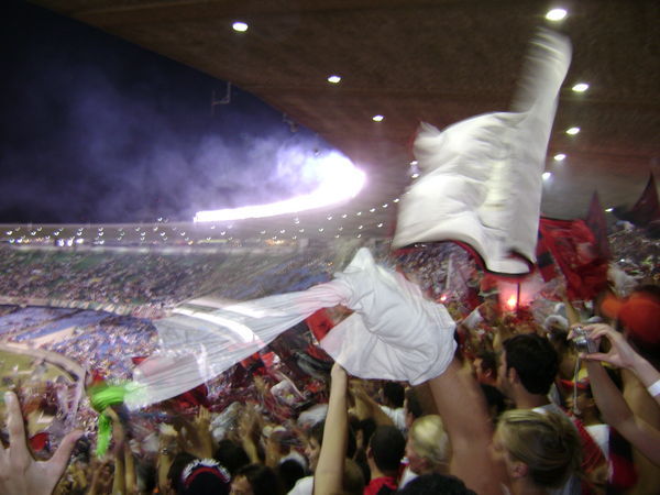 Fans wave their flags at The Maracana