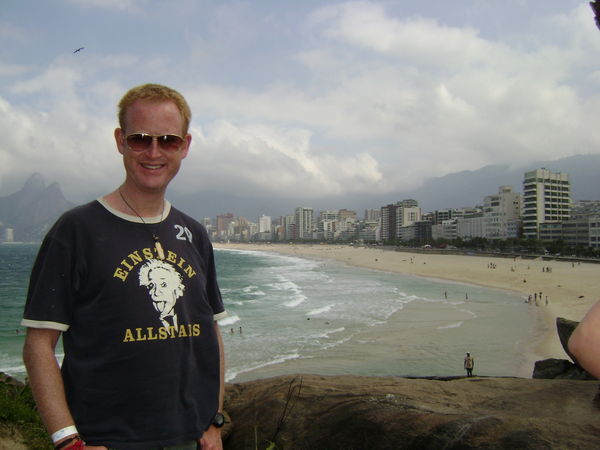 I pose in my dodgy ray-bans with Ipanema beach stretching behind me