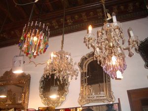Chandeliers hanging from ceiling of Venetian glass factory, Venice