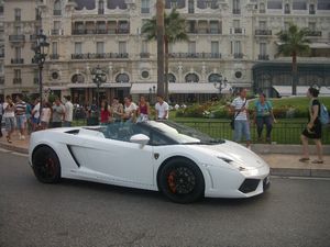 White Lamborghini car driving passed me in Monte Carlo