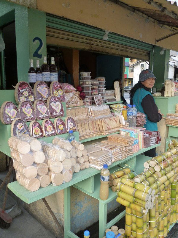 Sweets stand with sugar cane, dulce de guayaba and melcocha.