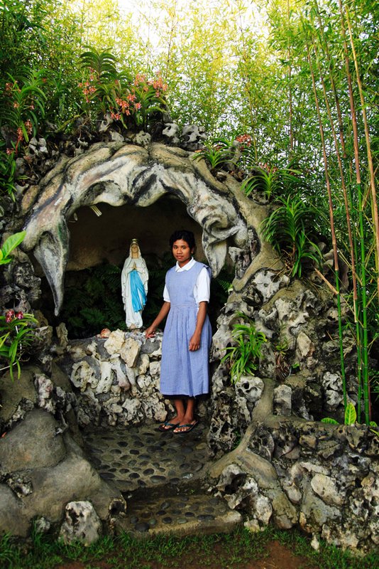 Trainee nun at small shrine