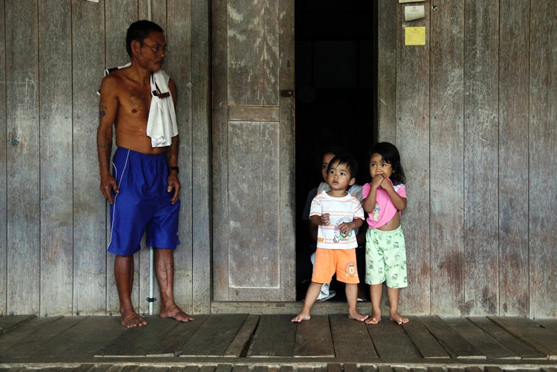 Longhouse resident with shy children