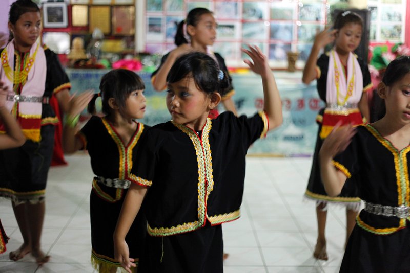 Local children dancing traditional dances