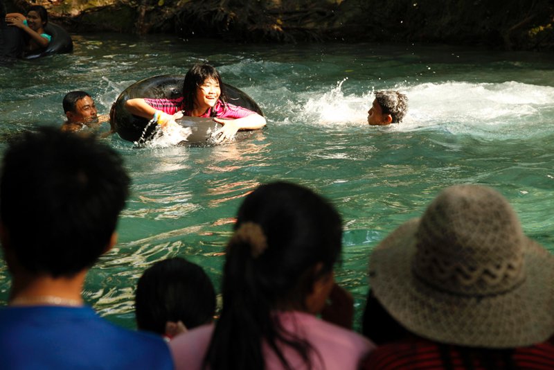 Thai youngsters enjoy a cooling dip