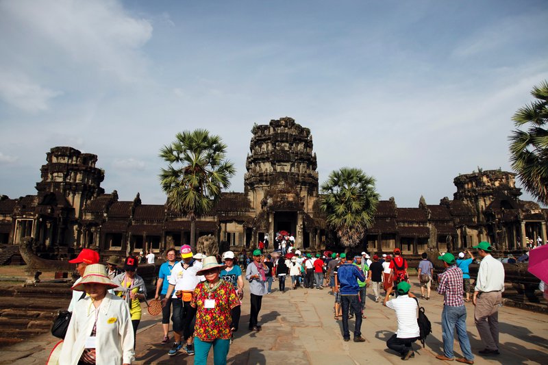 The green hat gang arrive at Angkor Wat.