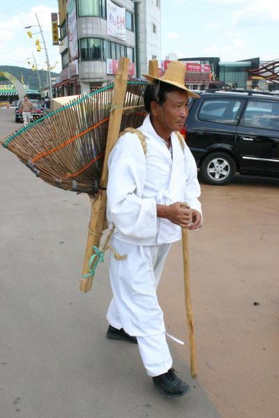 A farmer in traditional dress.