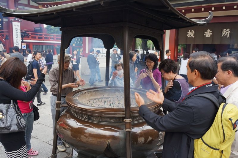 Purifying with smoke at the temple