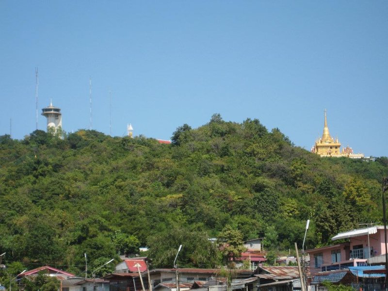 The golden Pagoda and Skytower on the hill