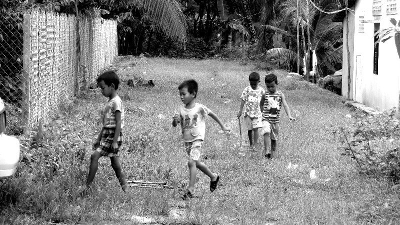 Children Play at the Roadside