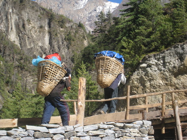 Porters carrying way too much!