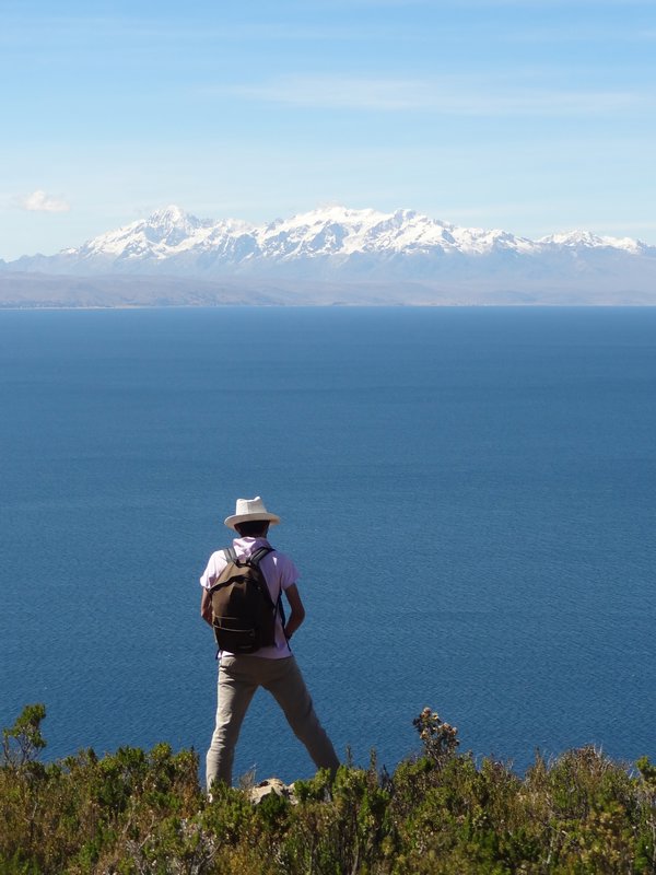 Lake Titicaca, with Remy in the foreground and the Andes in the background