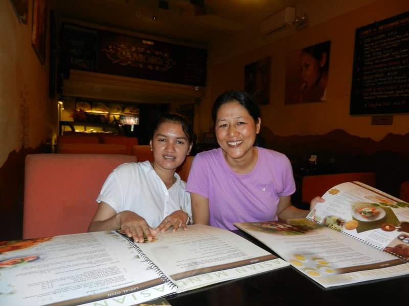 Sophall and Adono with the enormous menus