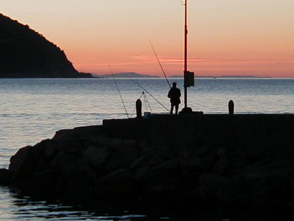 A Fisherman at Sunrise