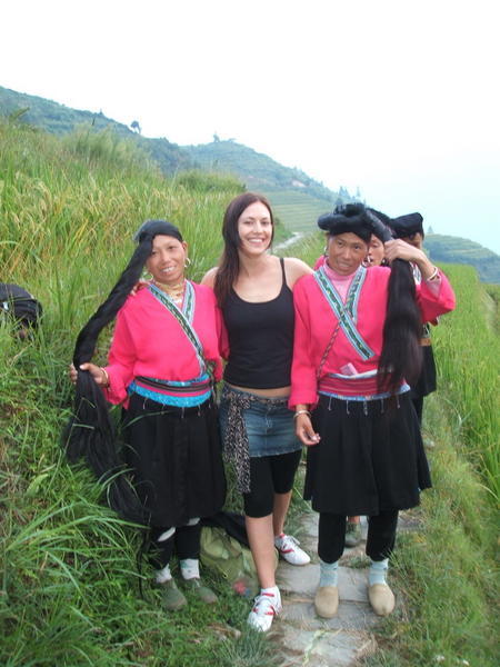 Long Haired Women in the rice terraces around Pingan