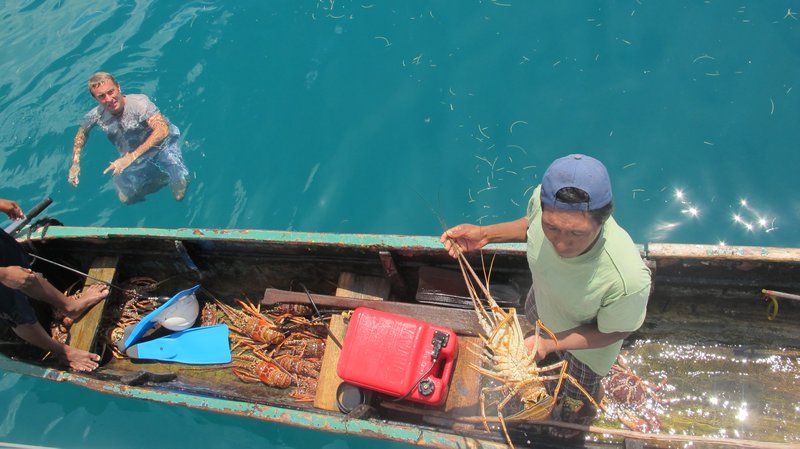 Locals selling crayfish and crabs