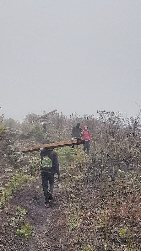 The loggers in bare feet and the freezing mist