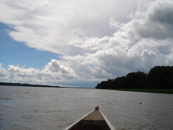 cloud formations over river amazon