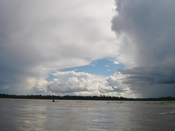 cloud formations over river amazon