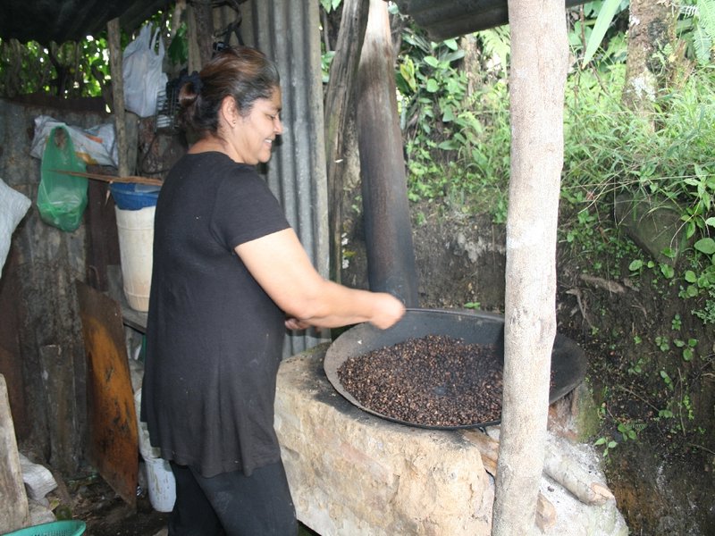 Lady roasting coffee in Honduras