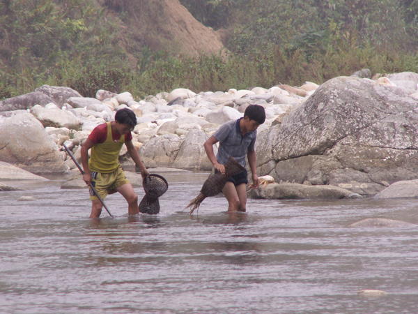 Boys fishing at Giang village