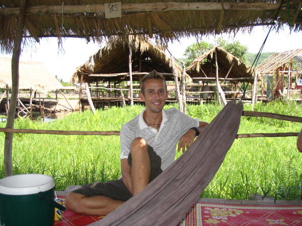 Neil cooling off in someone's house we think near Battambang