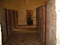 Brick prison cells inside S21 prison.
