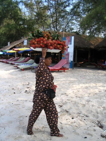 Rambutan lady on Sihanoukville beach