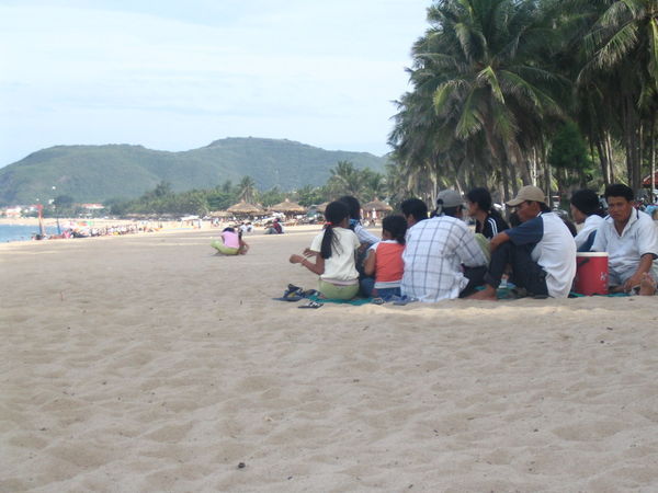 Vietnamese family on beach