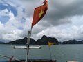 Very arty with the Vietnam flag in front of Halong limestone karsts
