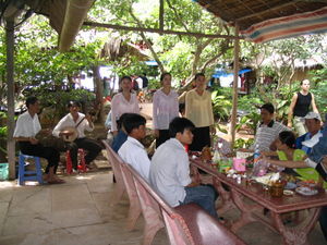 Traditional singing performance and Vietnamese digging into the free fruit