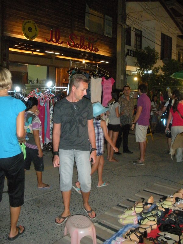 Neil looking at shoes at Bophut night market